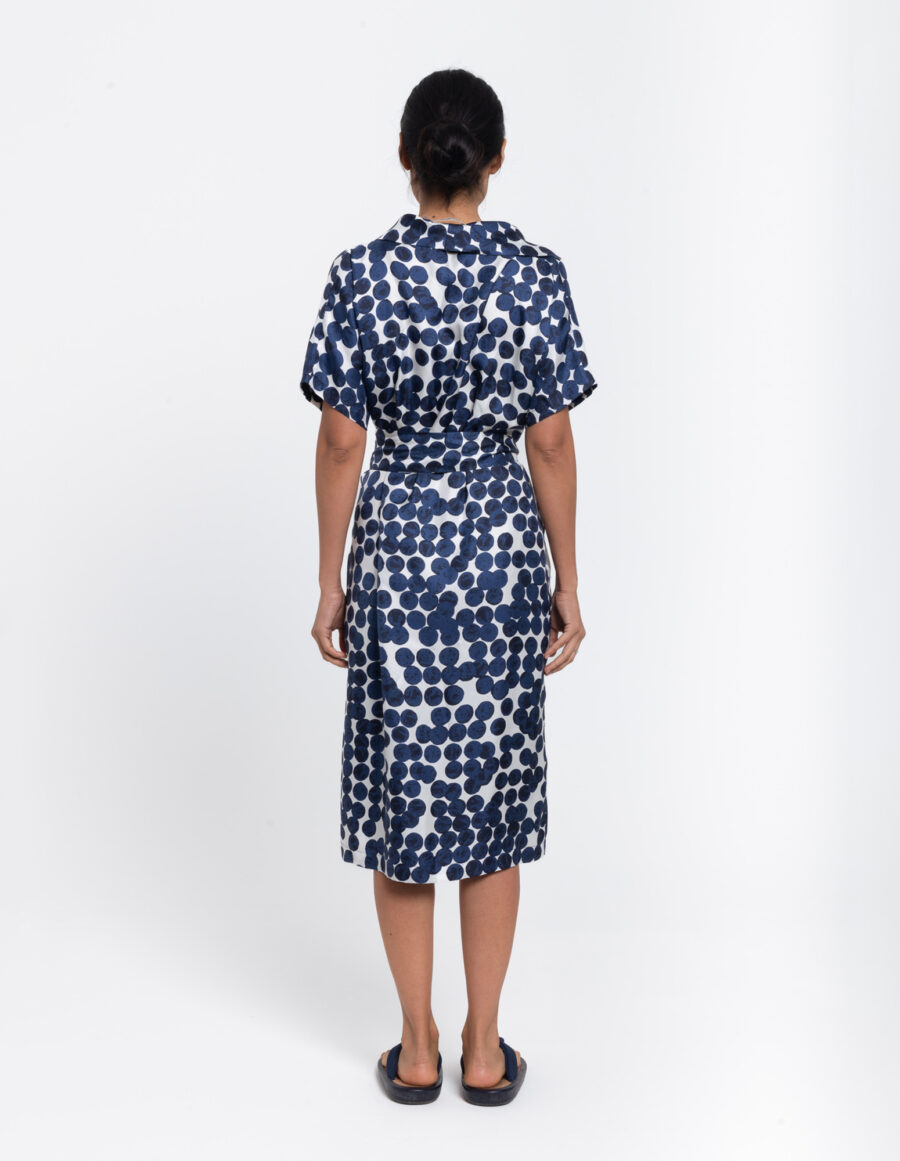 Belted dress with sailor collar in a geometric blue and white print in silk twill