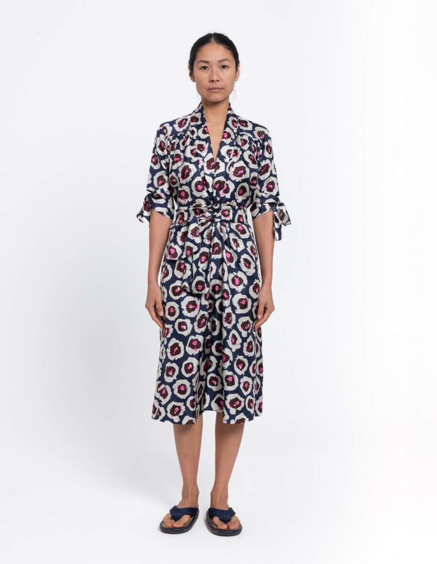 Feminine dress with shawl collar in a floral blue, brown and offwhite vintage print in silk twill
