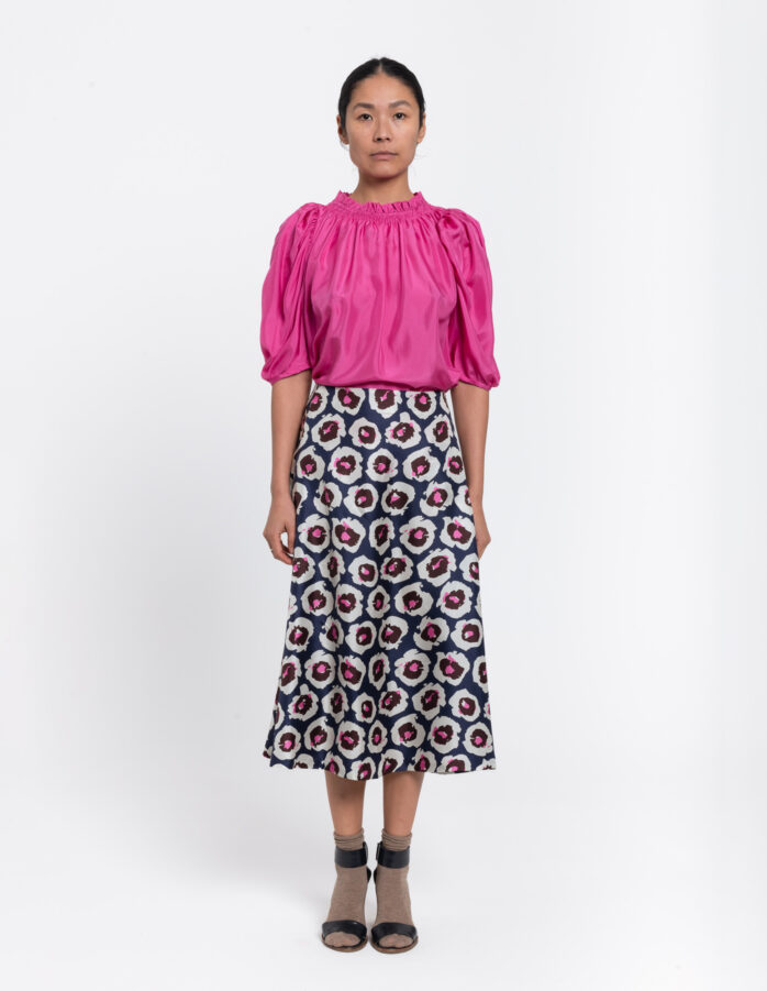 Feminine A-lined skirt in a geometric blue and white vintage print in silk twill