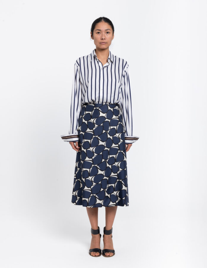 Feminine A-lined skirt in a floral blue, brown and white vintage print in silk twill