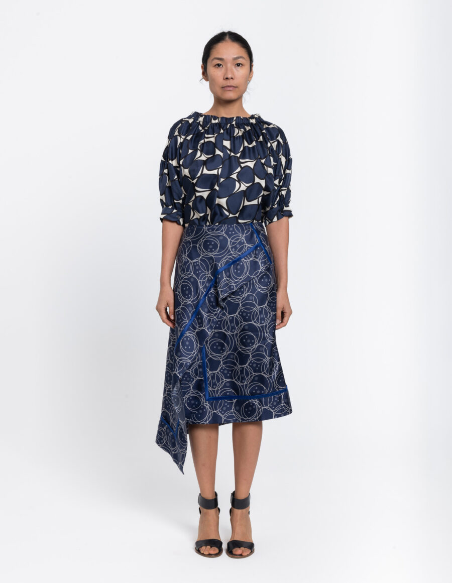 Assymetric skirt with biais detailing in a geometric blue and offwhite vintage print in silk twill