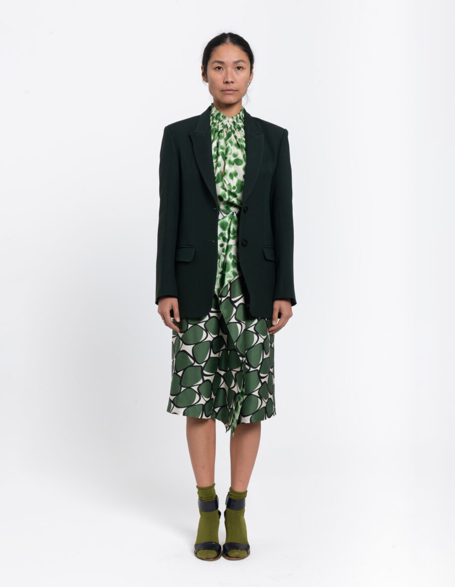 Skirt with ruffled front in a geometric green and offwhite vintage print in silk twill