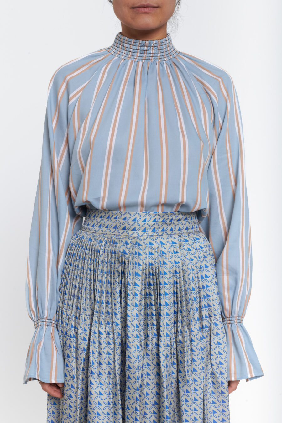 Top with gathered stand up collar in a striped light blue and brown cotton popline